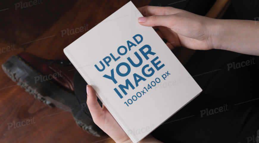 Woman Holding a Hardcover Book Photoshop PSD Mockup Template
