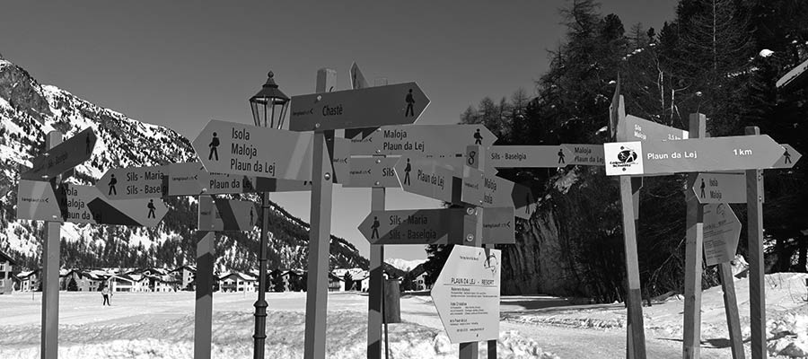 A group of directional signs.