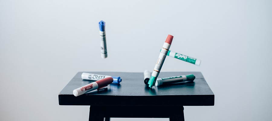 A whiteboard and markers.