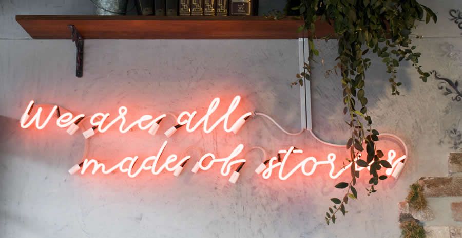 we are all made of stories neon sign