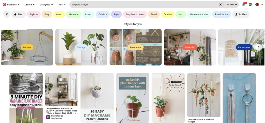 A screenshot of search results in Pinterest for the query, "DIY plant hanger." At the top of the search results, recommended related searches that can be useful to inform keywords are visible. 