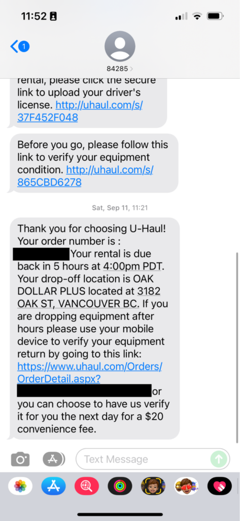 Screenshot of an SMS marketing text from U-Haul alerting the recipient of their rental reservation return time and location.