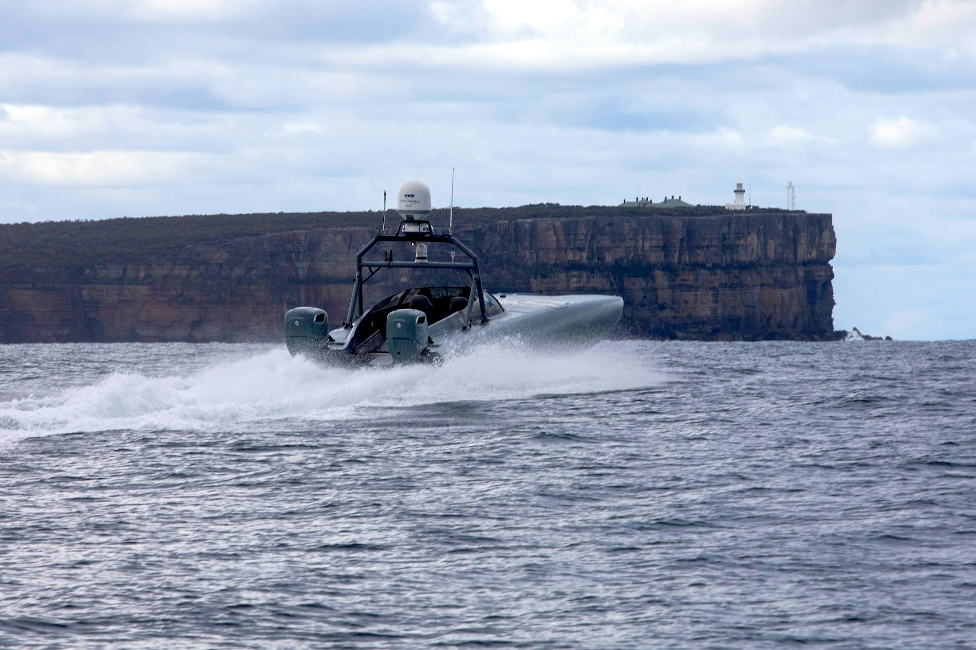 Will Australia's pursuit of unmanned navy boats with heavy weaponry violate international law?