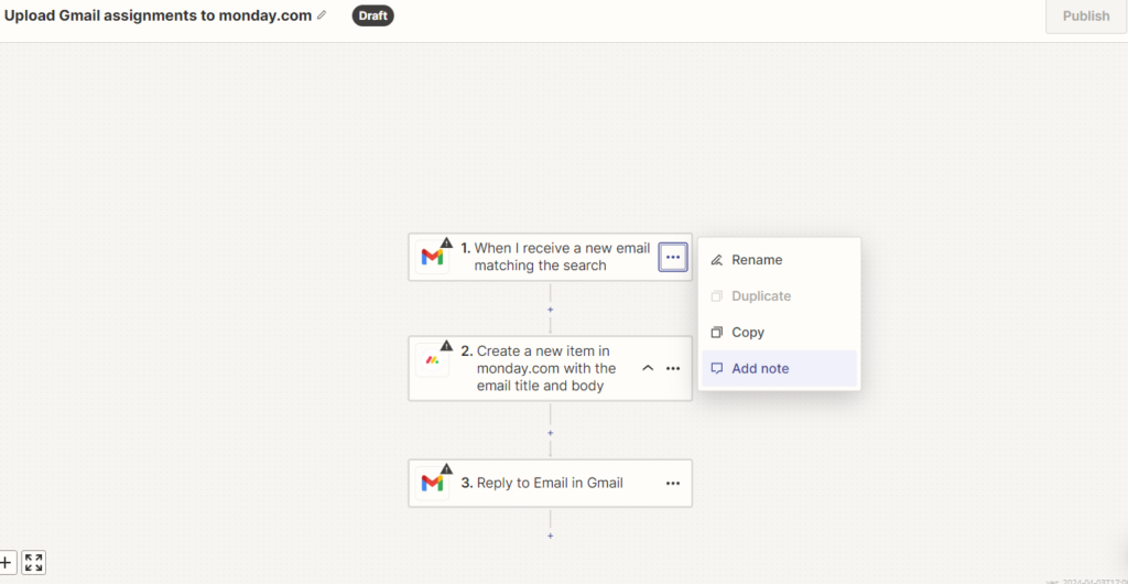Zapier's visual editor for a zap with steps for Gmail and monday.com.