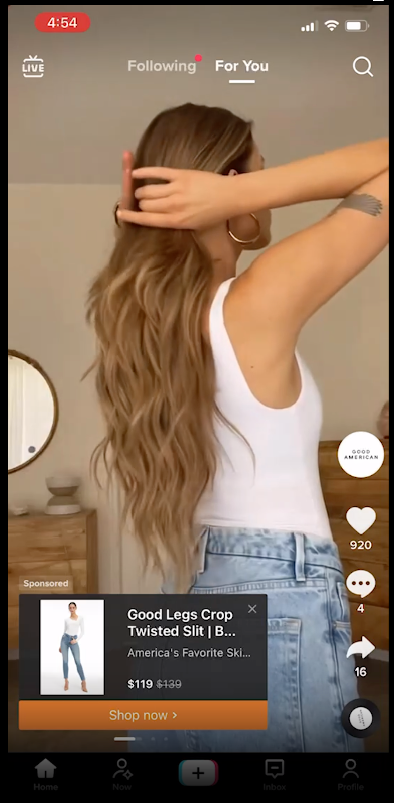 Good American TikTok ad creative shows a woman wearing blue jeans.