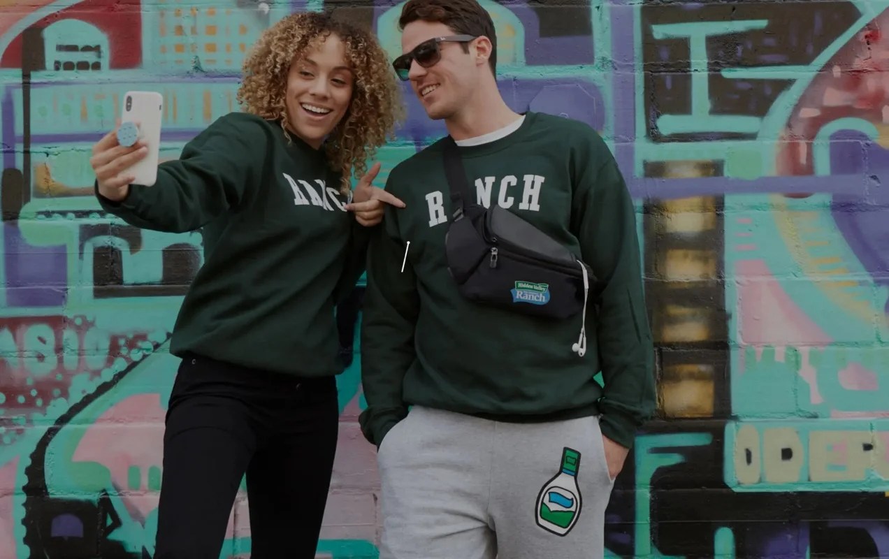 two people in green hidden valley ranch merch