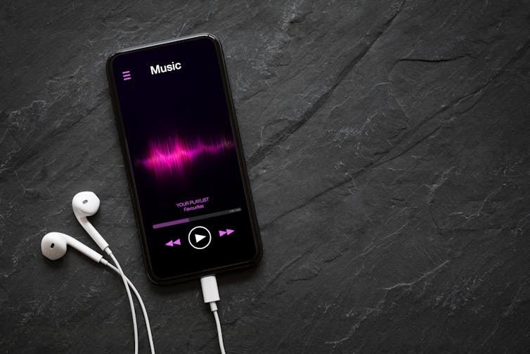 Mobile phone displaying a music streaming app.