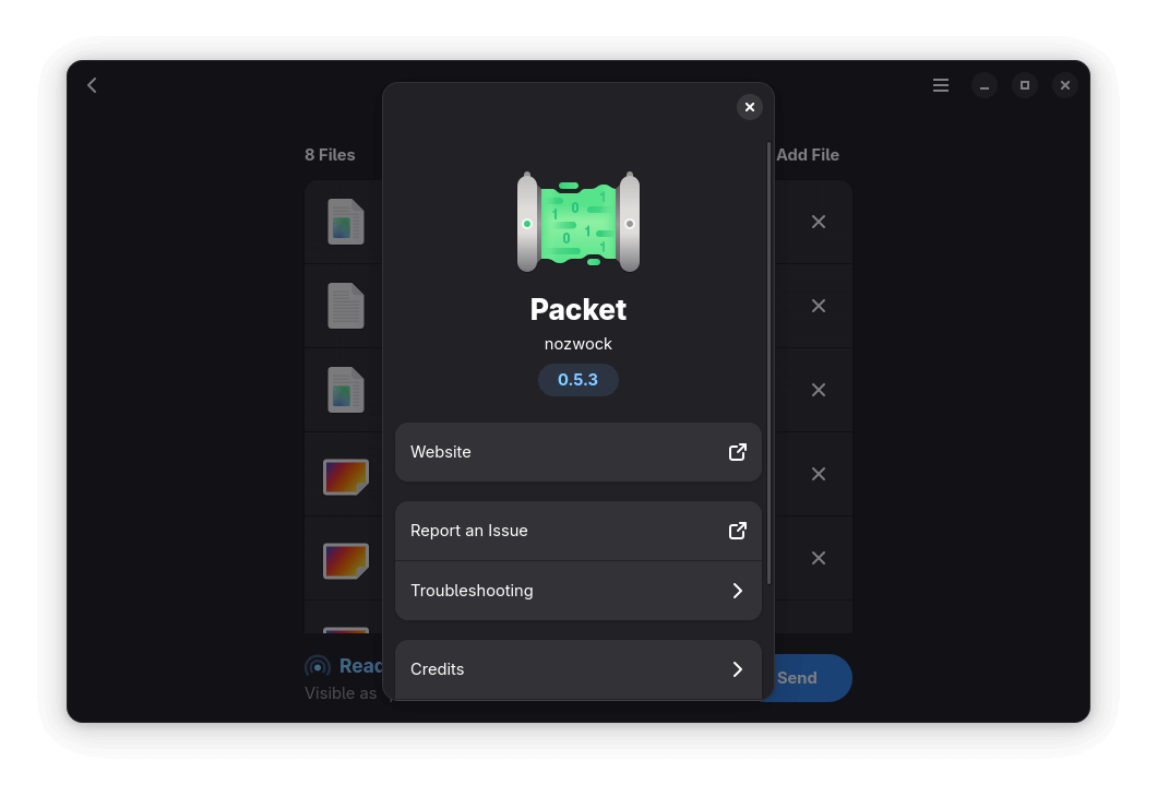 the about dialog for paket is shown with relevant information and a few buttons, the background has five files added for transfer