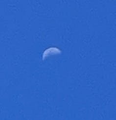 A daylight phone photo of the Moon